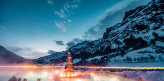Nella Valle di Saas e alle terme di Leukerbad per un weekend a tutto relax Tramonto invernale alla Leukerbad Therme, il più grande complesso termale alpino d'Europa