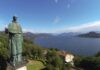 statua san carlone con panorama sul sul lago maggiore